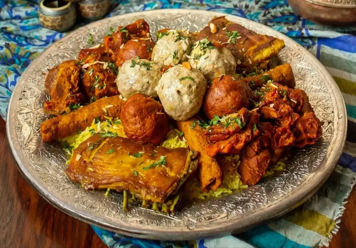 A traditional Wazwan feast served on a trami